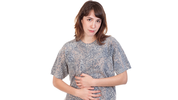 woman_holding_stomach_shutterstock