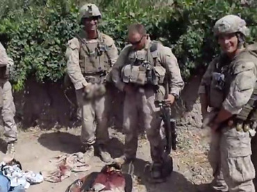 A still image taken January 11, 2012 from an undated YouTube video shows what is believed to be U.S. Marines urinating on the bodies of dead Taliban soldiers in Afghanistan. (Reuters/YouTube)