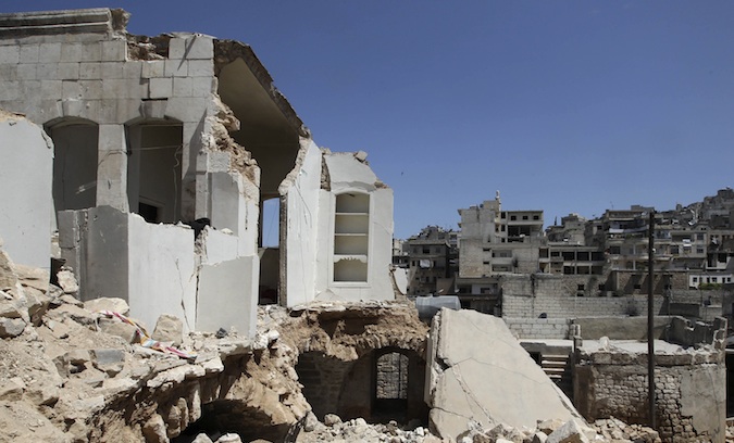 A general view shows damaged buildings in Salqin city