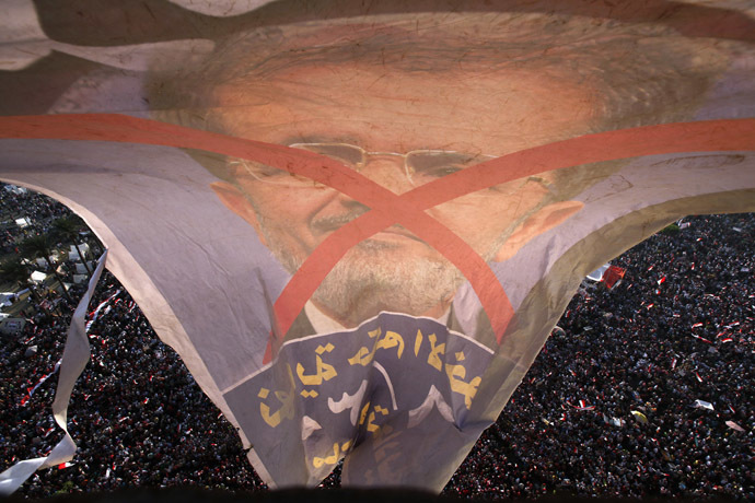 Protesters opposing Egyptian President Mohamed Morsi shout slogans against him and Brotherhood members during a protest at Tahrir Square in Cairo June 30, 2013. (Reuters/Mohamed Abd El Ghany)