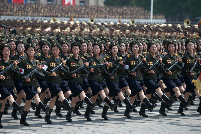 North Korean soldiers march during a military parade past Kim Il-Sung square marking the 60th anniversary of the Korean war armistice in Pyongyang on July 27, 2013. (AFP Photo/Ed Jones)