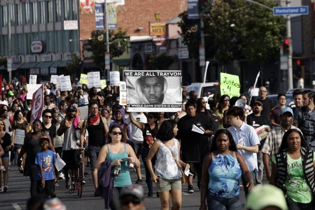 Demonstrators in Los Angeles protest the acquittal of George Zimmerman in the Trayvon Martin trial on Sunday.