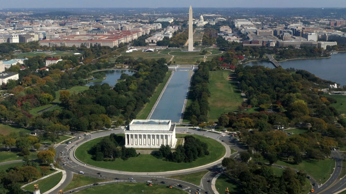 The Lincoln Memorial (foreground), Washington Monument (C) and US Capitol (background) are seen from air on the National Mall above Washington, DC. (AFP Photo/Saul Loeb)