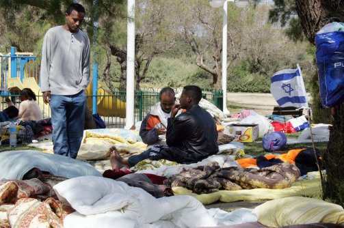 African asylum seekers from Ivory Coast and Eritrea gather at a public park in Tel Aviv on March 13, 2008. (Jack Guez /AFP / Getty Images)