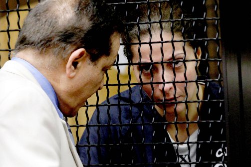 Saudi princess Meshael Alayban listens to an interpreter during an appearance in court on July 11. (Nick Ut/AP)