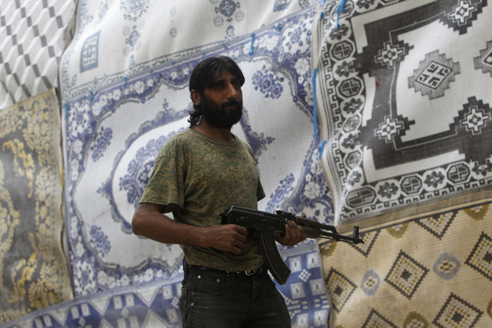 Free Syrian Army fighter (Reuters/Muzaffar Salman)