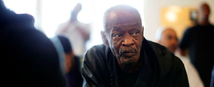 U.S. military veterans listen to speeches during a Veterans Day observance for homeless veterans at The Midnight Mission shelter on skid row in Los Angeles, Calif. on Nov. 11, 2013. LUCY NICHOLSON/REUTERS