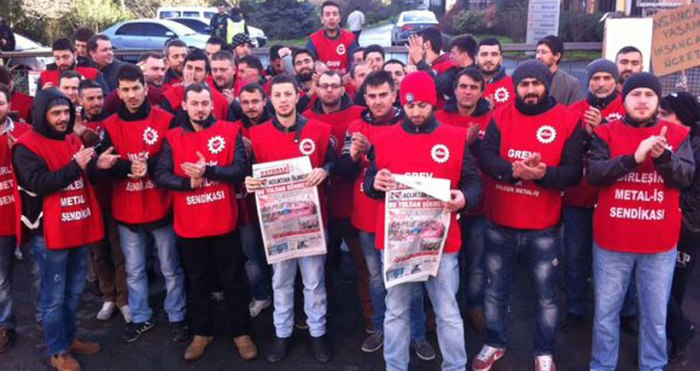 A group of workers from a steel factory in Turkey - the photo was taken when they were at the strike.